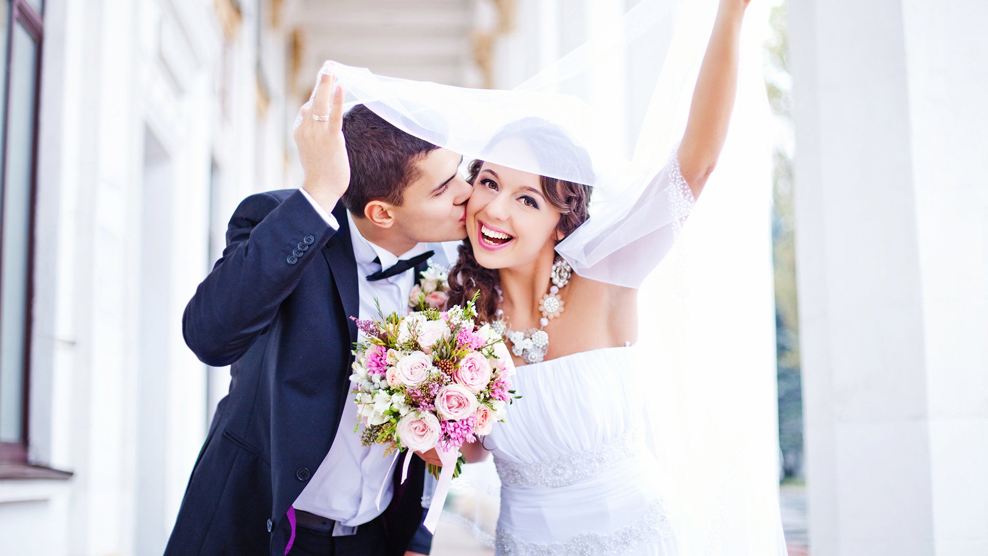 A cute newly married couple with flower