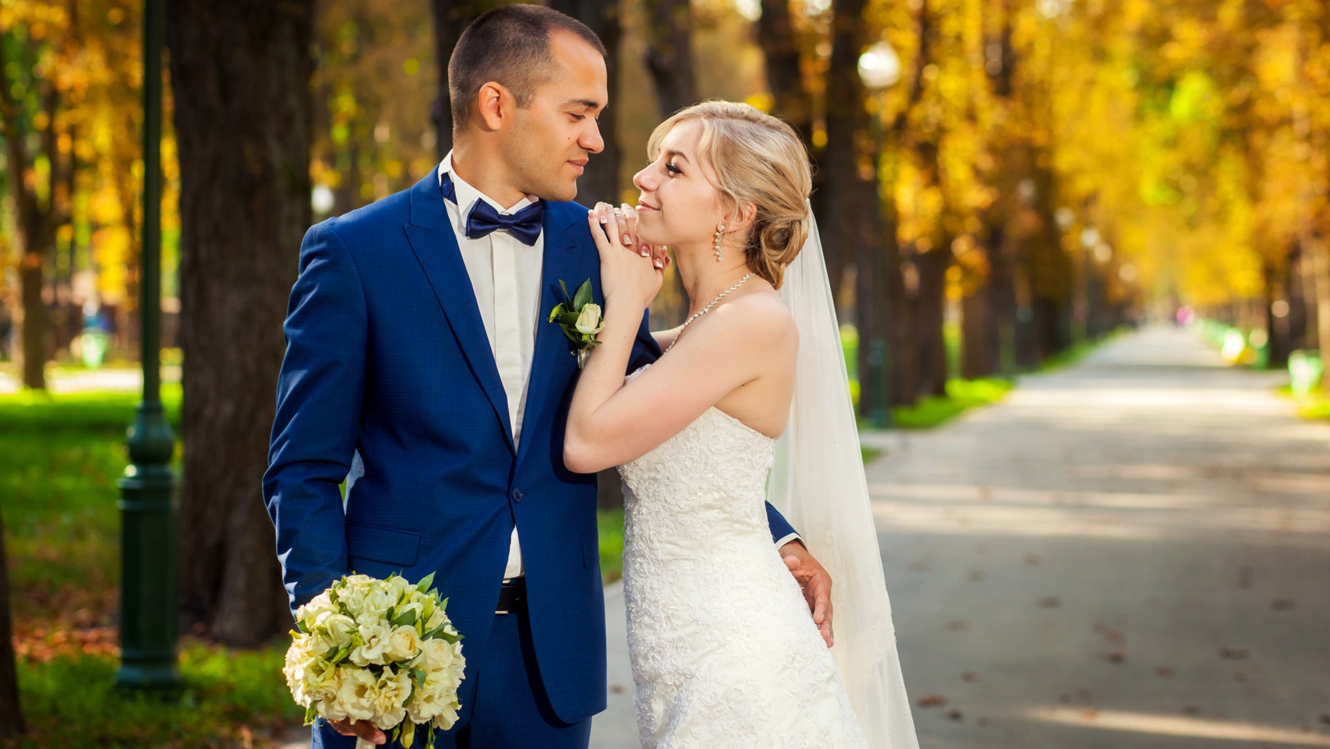 A pretty lady touching her hubby shoulder